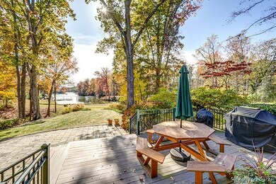 Wooden terrace featuring area for grilling