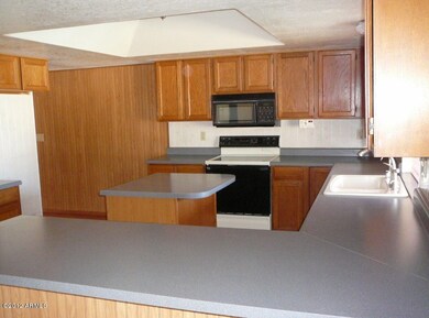 MEDIUM OAK CABINETRY THROUGHOUT HOME