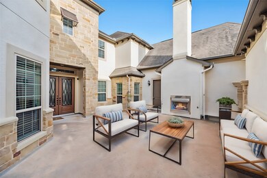 The beautiful center courtyard, with outdoor fireplace offers a serene setting for your morning coffee or afternoon tea!