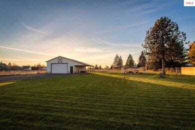 Completely fenced and landscaped backyard and a fu