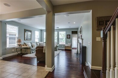 Hallway view of great room and kitchen