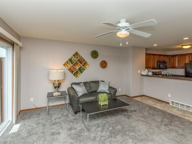 Living Room and Breakfast Bar/Kitchen