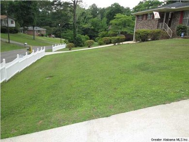 Large front yard overlooking the neighborhood.