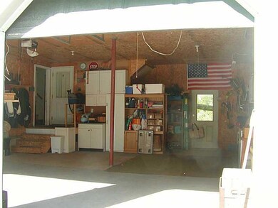 Garage. WITH WORK SHOP AREA AND STORAGE