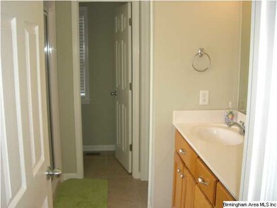 A separate water closet is at the end of the maste
