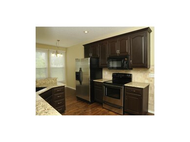 Open kitchen is ready for your decor and guests to