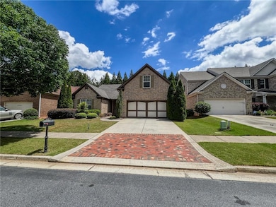 View of front of property with concrete driveway, 