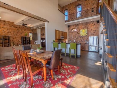 Exposed vintage beams and interior brick walls.  S