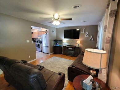View of living room as you walk in the front door.