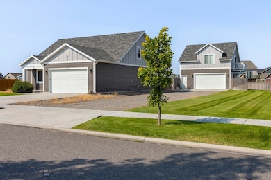 Main home, mature lawn and ADU above detached gara