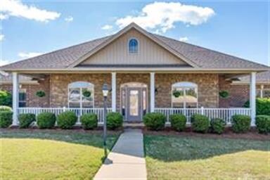 GREAT CURB APPEAL WITH WRAP AROUND FRONT PORCH AND