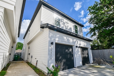 Spacious garage with extra parking for convenience