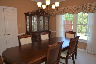 Open to the living room is the formal dining room 