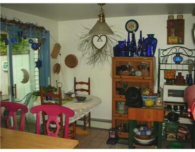Kitchen. Dining area with Sliders to...