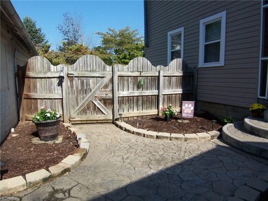 Additional view of the back area between house and