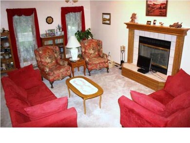 Formal Living with picture windows out the front