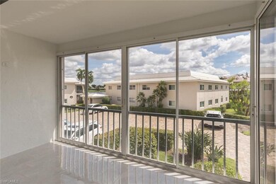 Enclosed screened lanai with sliders, keeps it cle