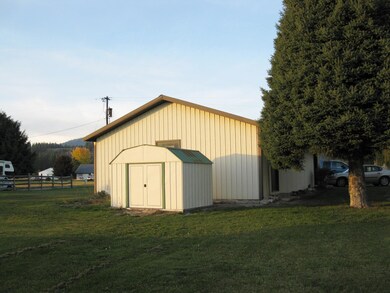 Storage Shed & Rear View of Shop