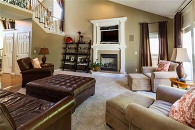 Vaulted great room with cathedral ceiling and open