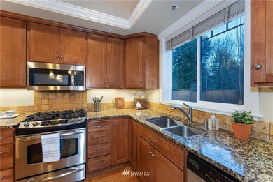 It's delightful having such a big kitchen window, especially in front of a sink! Much gazing to be done, along with the dishes!