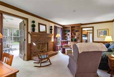 Family room w/ wood burning fireplace