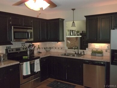 Newer stainless steel appliances, counters, tile b