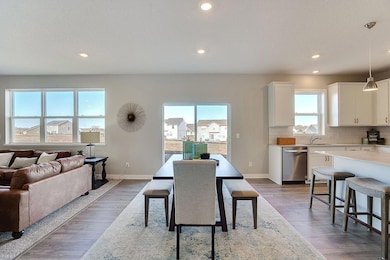 The kitchen space leads straight into the dining area, which stretches 17-feet across and leaves enough space to accommodate any dining table configuration! Photo of model, colors and options will vary.