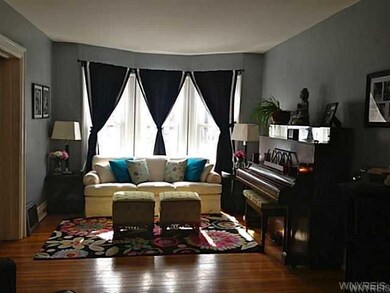 Living Room Gleaming hardwood floors, new windows 