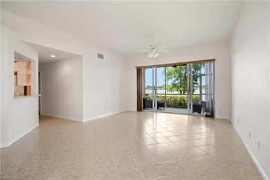Unfurnished room with light tile patterned floorin