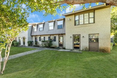View of front of property featuring a front lawn