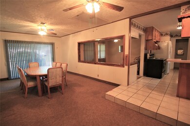 Large Dining Area adjacent to Living Room and Kitchen