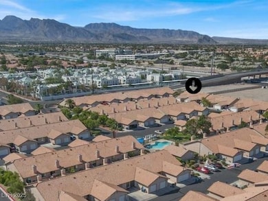 Aerial perspective of suburban area with mountains