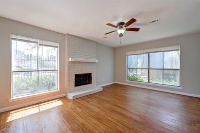 Light & bright living room w/ view to the pool