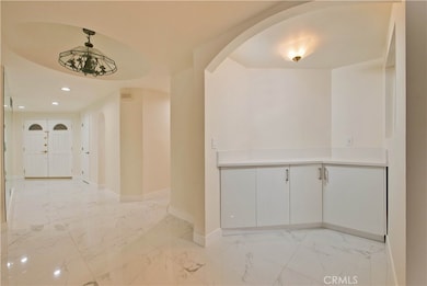 Front door, hallway/foryer, & bar