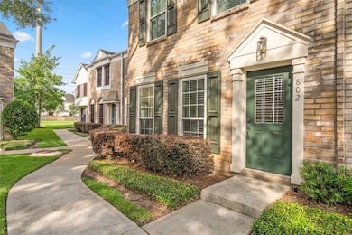 Side view showcases the home’s well-maintained bri