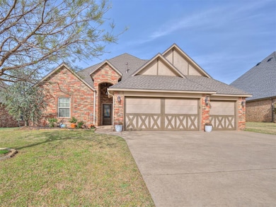 View of front of home with a front lawn, driveway, roof with shingles, and brick siding