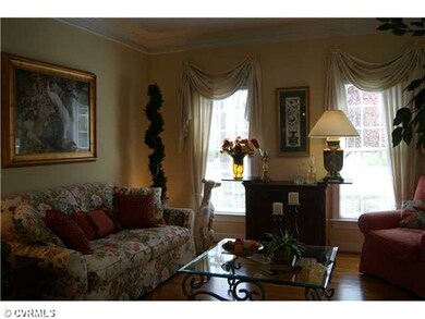 Living Room - Formal living room has hardwood floo