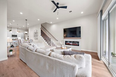 Sunlit living space with wide plank Swiss flooring