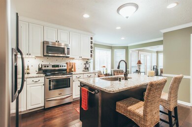 The kitchen was upgraded with crafted cabinets to fill the wall spaces sufficiently. Extra storage bins & open front racks all custom made.