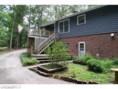 Exterior Back. Separate entrance to lower level - in-law suite, man cave...