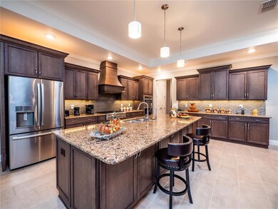 OPEN KITCHEN WITH LARGE ISLAND.