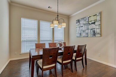 The formal dining room has can easily accommodate eight and is flooded with natural light.