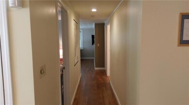 Hallway leading to bedrooms,...