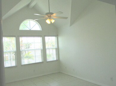 Soaring ceilings and lots of windows in this maste