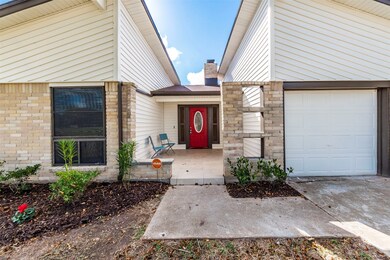View of front patio with tiled entry way