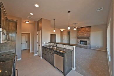 Kitchen opens up to Family Room