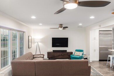 Living room opens to kitchen.