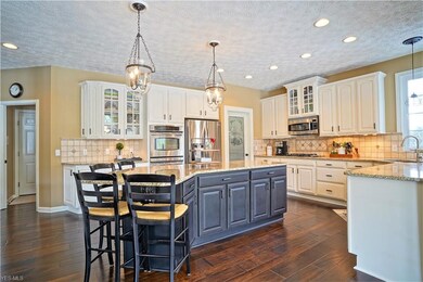 Newly updated kitchen featuring: 2 toned cabinetry