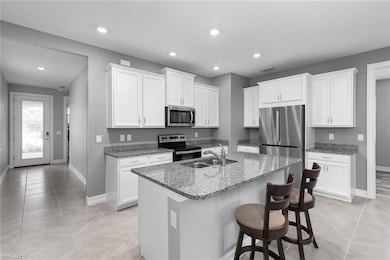 Kitchen with appliances with stainless steel finis