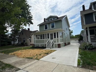 View of front facade featuring a garage